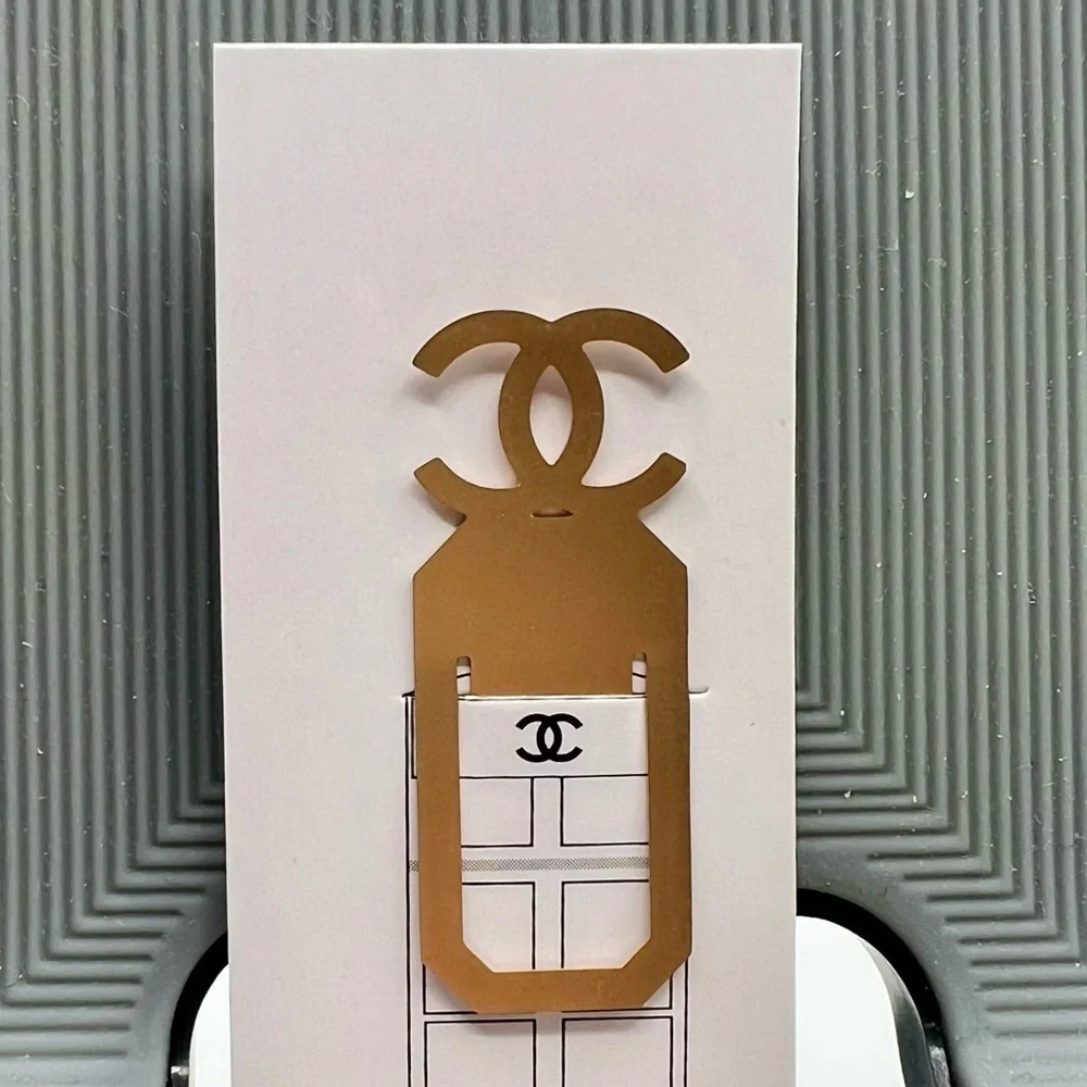 New CHANEL Gold Logo Bookmark